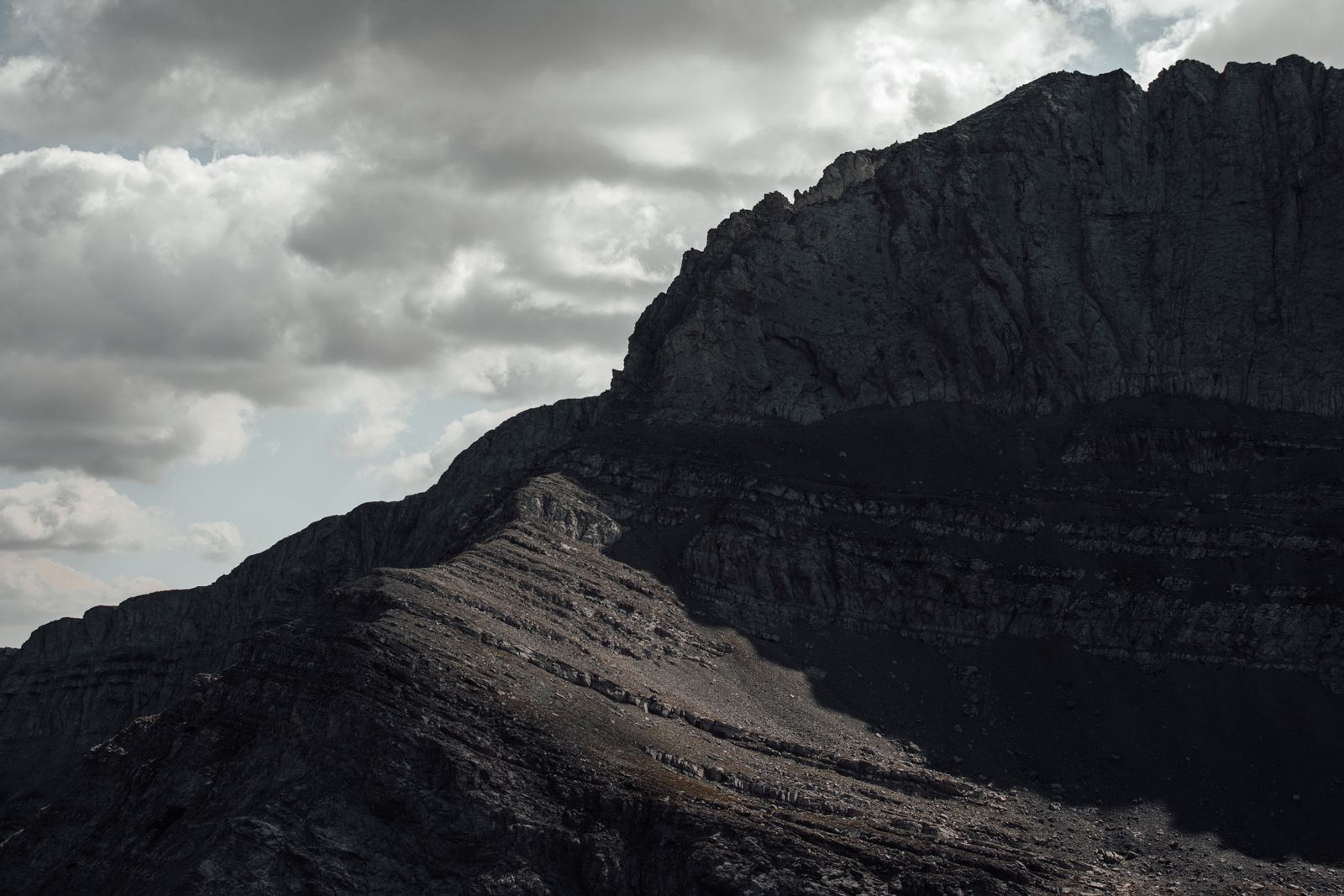 Rocky Mount Olympus peak under dramatic sky
